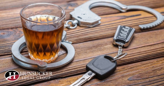 drink, car keys, and handcuffs